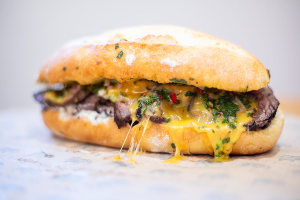 photo of a steak chimichurri sandwich
